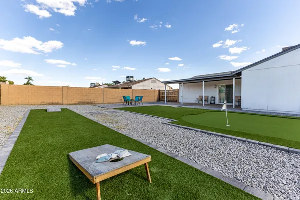 a view of a backyard with a garden