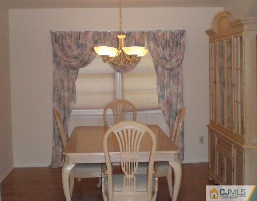 30 Brookside Road Edison, NJ 08817 - Photo 2 of 8 a view of balcony and wooden floor
