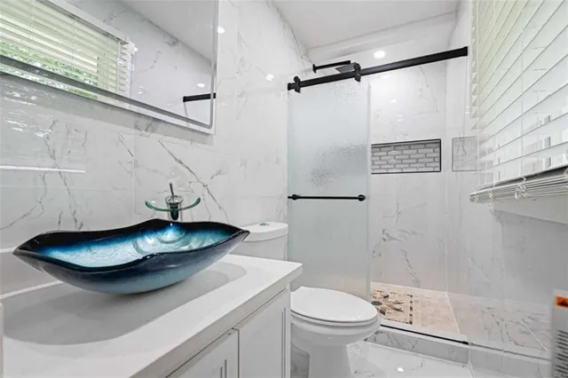 a bathroom with a sink and a toilet