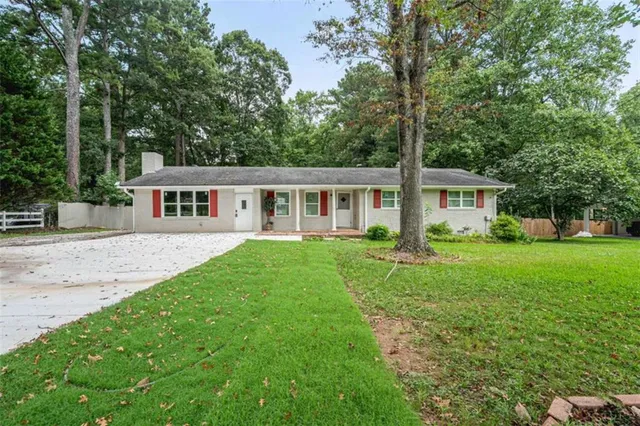 a house view with a garden space