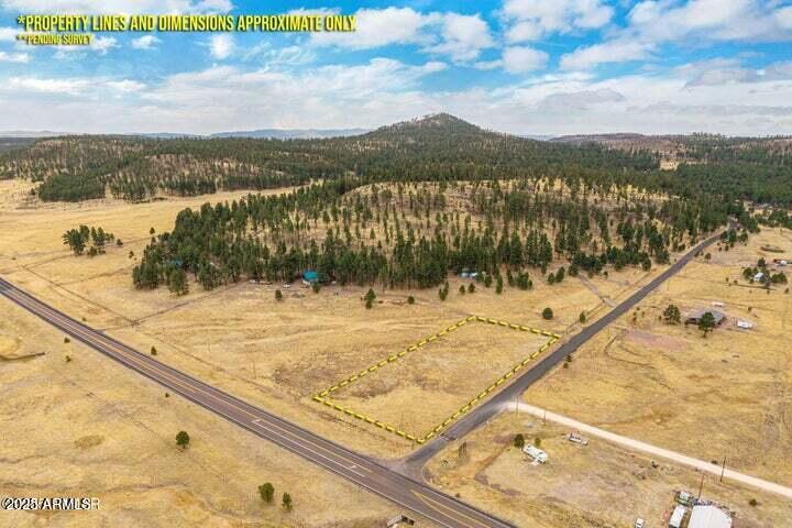 a view of swimming pool with a lake view