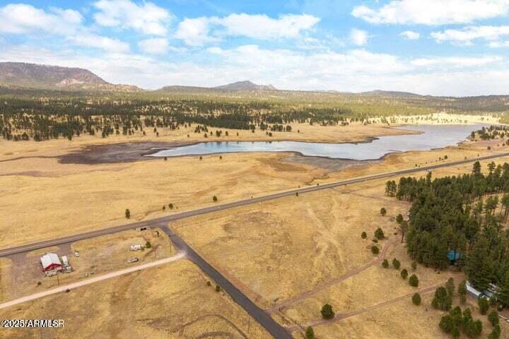 440 2104, Unit 5J Alpine, AZ 85920 - Photo 2 of 15 a view of an ocean and beach