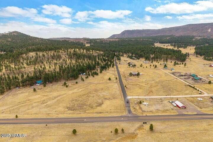 440 2104, Unit 5J Alpine, AZ 85920 - Photo 3 of 15 a view of a swimming pool with a lake