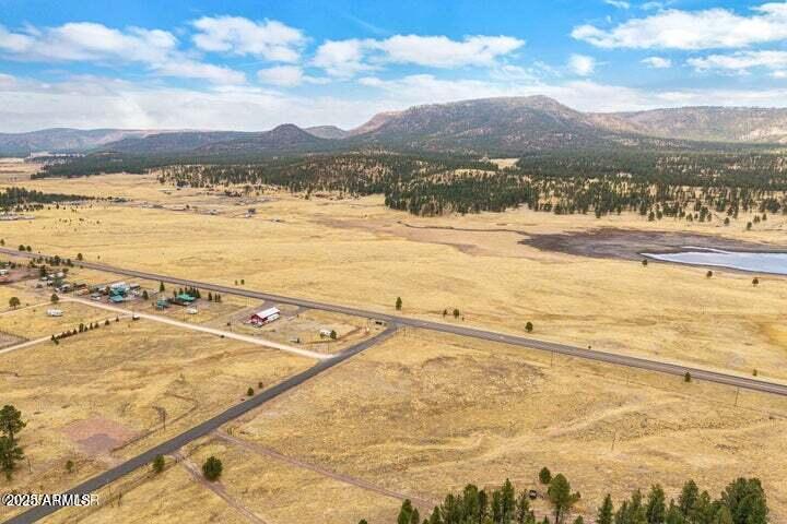 440 2104, Unit 5J Alpine, AZ 85920 - Photo 6 of 15 a view of an ocean and a mountain