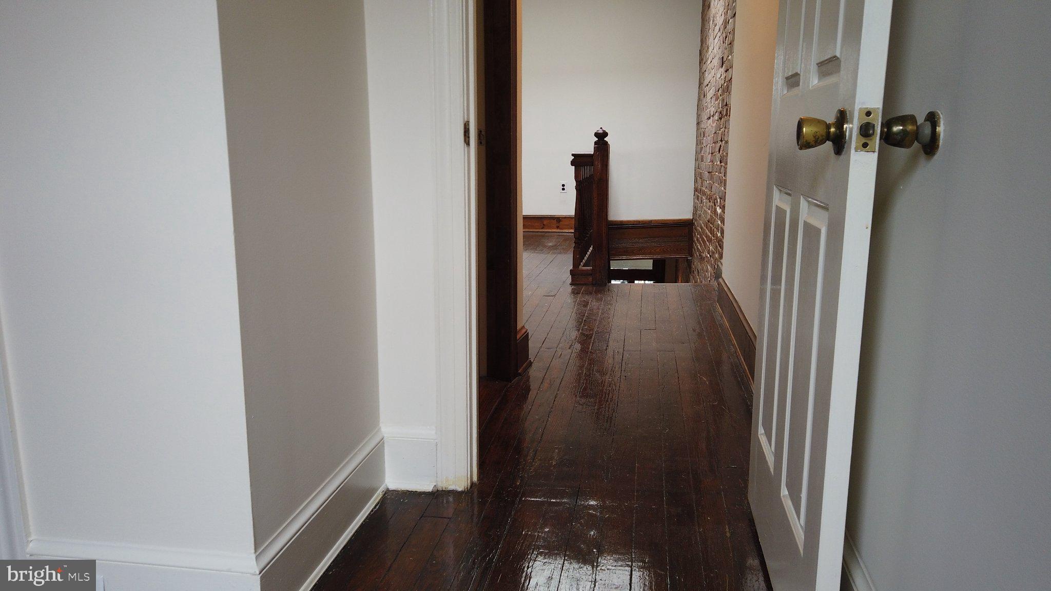 604 9th Street Northeast Washington, DC 20002 - Photo 15 of 28 Inviting hallway with polished floors.