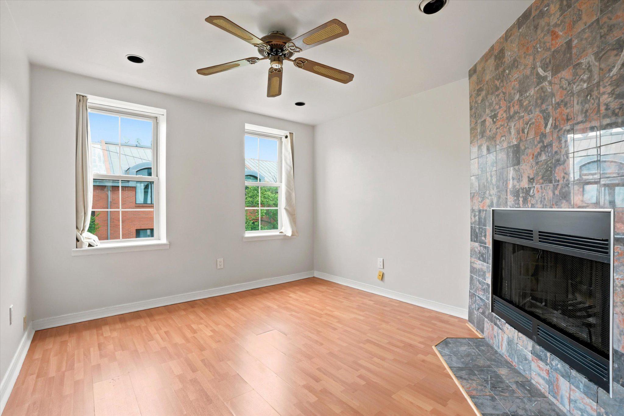 330 Monroe Street Philadelphia, PA 19147 - Photo 26 of 33 Primary bedroom, with wood burning fireplace.
