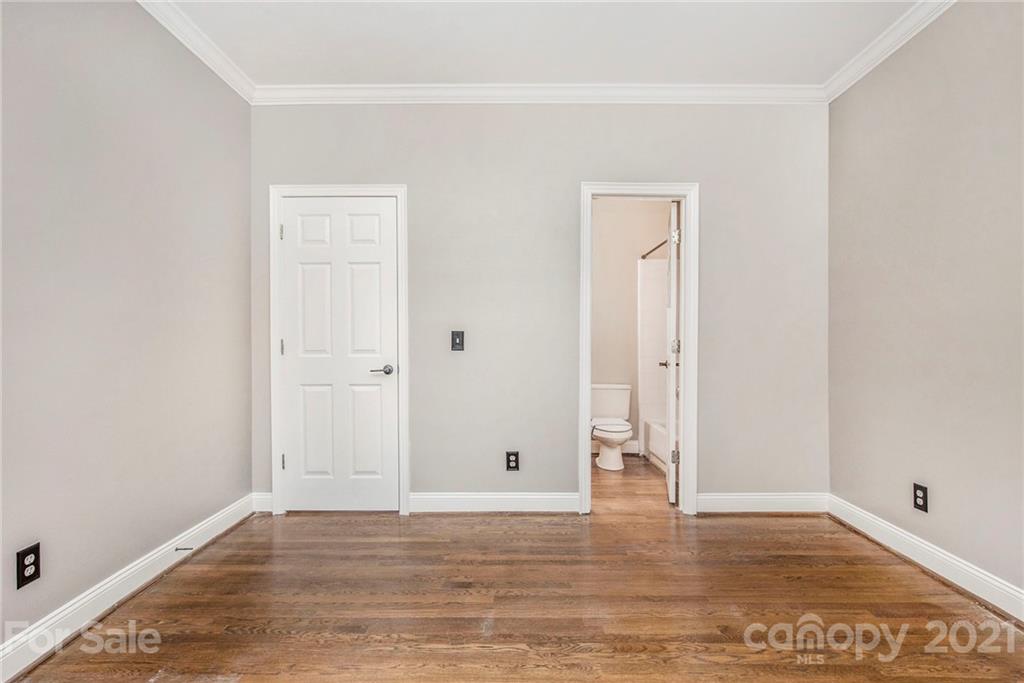5730 Closeburn Road, Unit N Charlotte, NC 28210 - Photo 15 of 21 a view of empty room with wooden floor