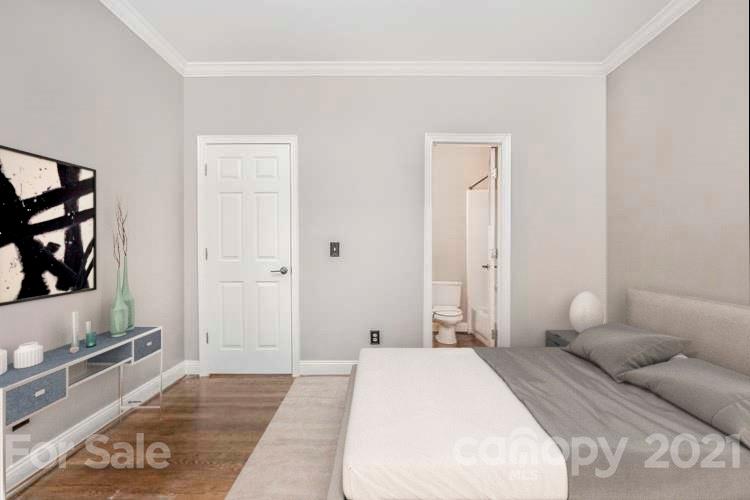 5730 Closeburn Road, Unit N Charlotte, NC 28210 - Photo 3 of 21 a bedroom with a bed and a window