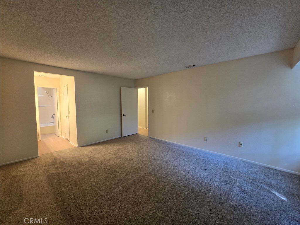 600 Central Avenue, Unit 386 Riverside, CA 92507 - Photo 14 of 21 a view of an empty room and closet area