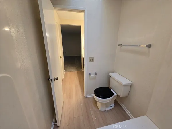 a bathroom with a toilet and a sink