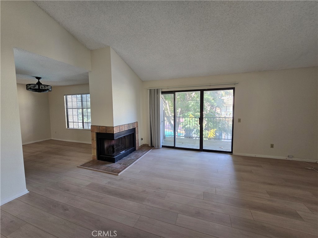 600 Central Avenue, Unit 386 Riverside, CA 92507 - Photo 3 of 21 an empty room with windows and ceiling fan