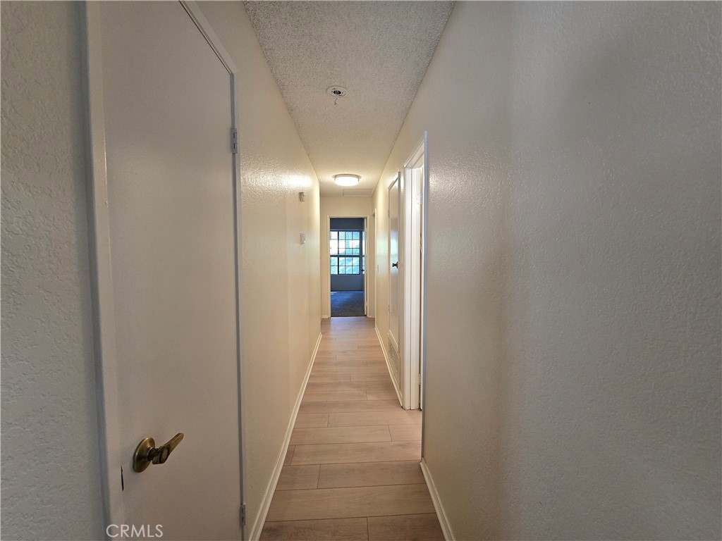 600 Central Avenue, Unit 386 Riverside, CA 92507 - Photo 8 of 21 a view of a hallway