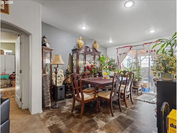 a view of a dining room with furniture