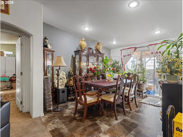 a view of a dining room with furniture