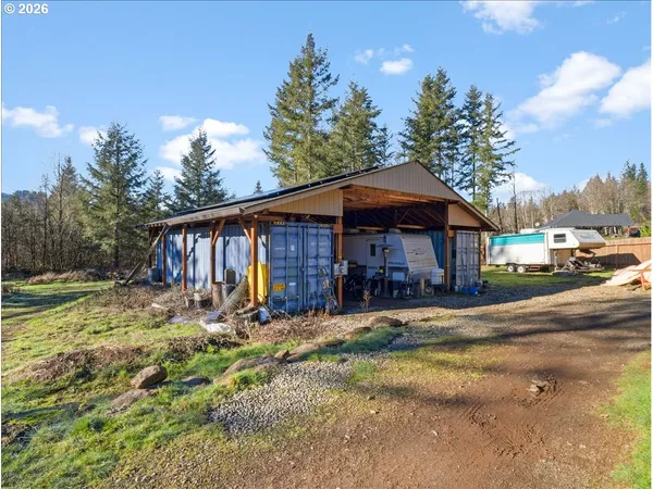 a swimming pool with outdoor seating and yard