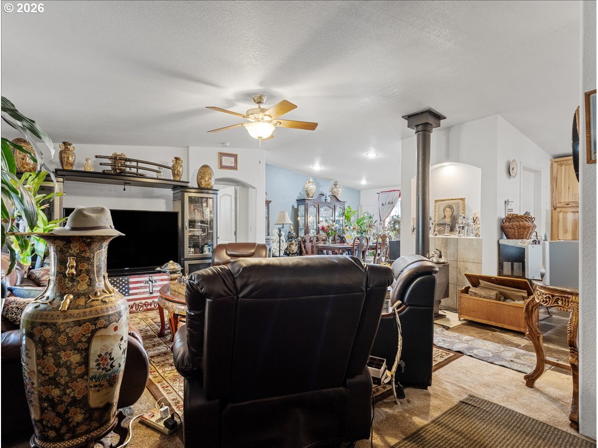 23728 Northeast Dole Valley Road Yacolt, WA 98675 - Photo 5 of 46 a view of a livingroom with furniture and a chandelier