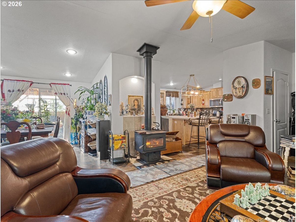 23728 Northeast Dole Valley Road Yacolt, WA 98675 - Photo 6 of 46 a living room with furniture and a large window