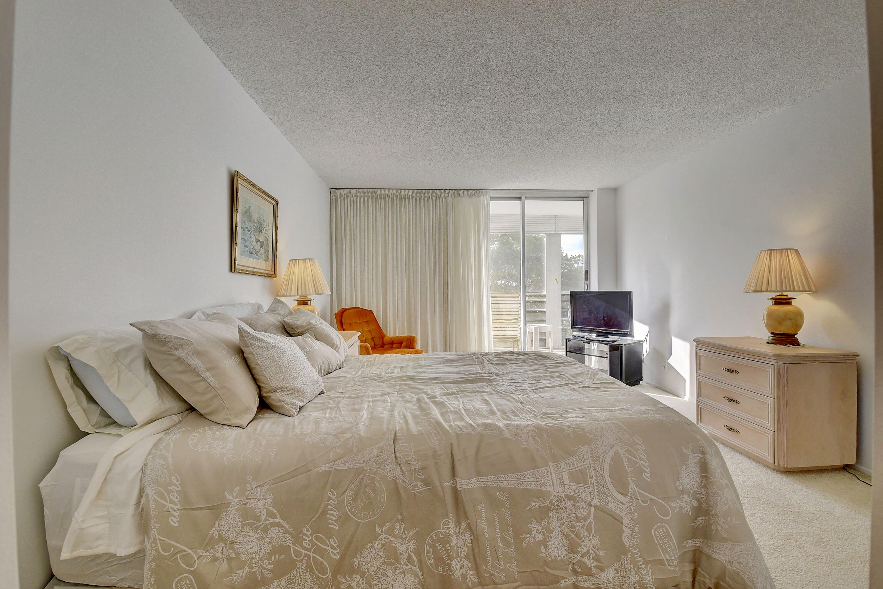 6461 Northwest 2nd Avenue, Unit 511 Boca Raton, FL 33487 - Photo 17 of 36 Primary Bedroom