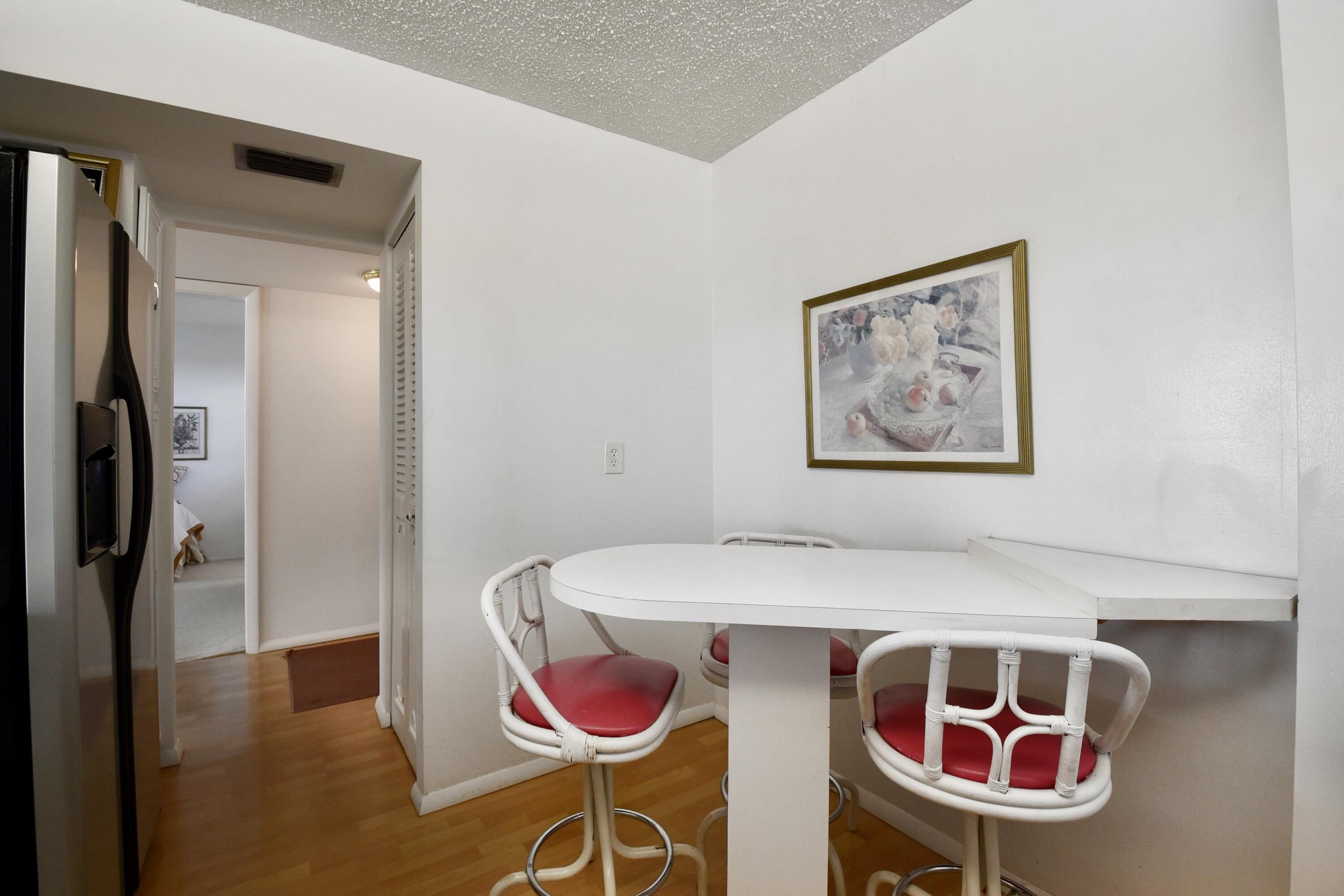 6461 Northwest 2nd Avenue, Unit 511 Boca Raton, FL 33487 - Photo 7 of 36 Kitchen table