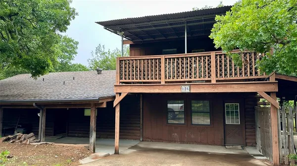 a view of a house with a deck