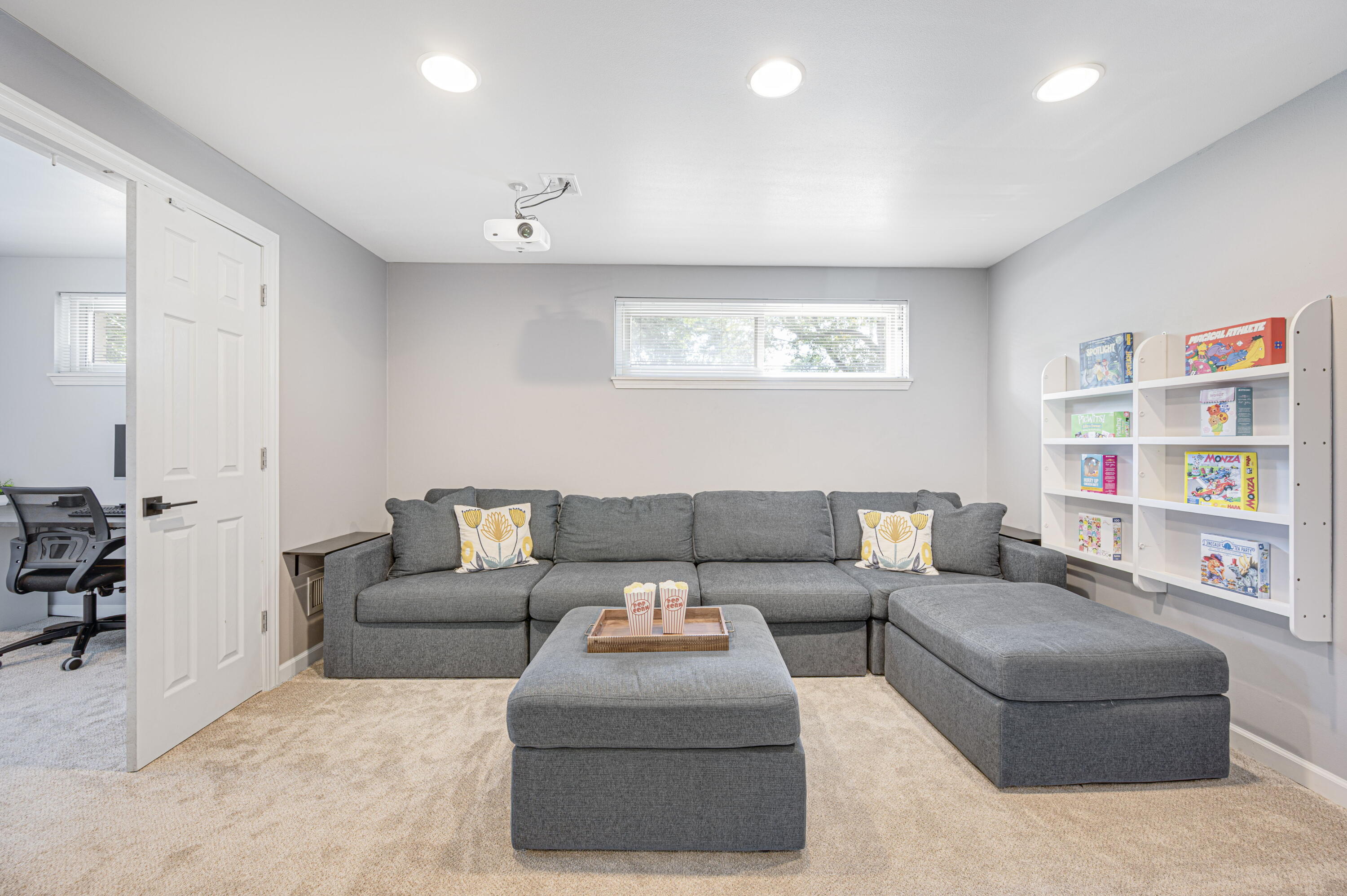 8680 North Regent Road Fox Point, WI 53217 - Photo 12 of 23 Lower-Level Rec Room with Projector
