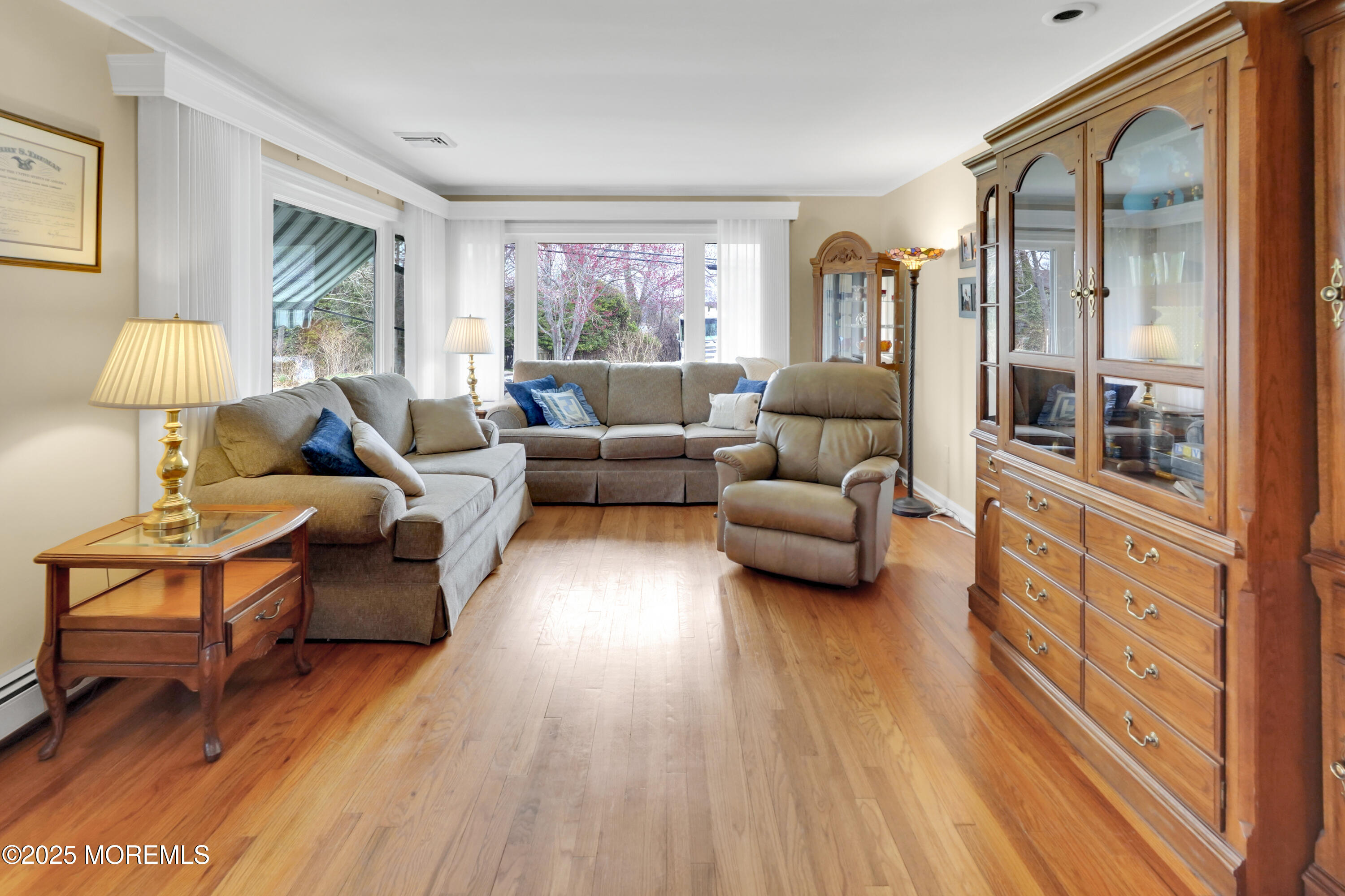 1635 Marconi Road Wall, NJ 07719 - Photo 11 of 39 a living room with furniture and a wooden floor