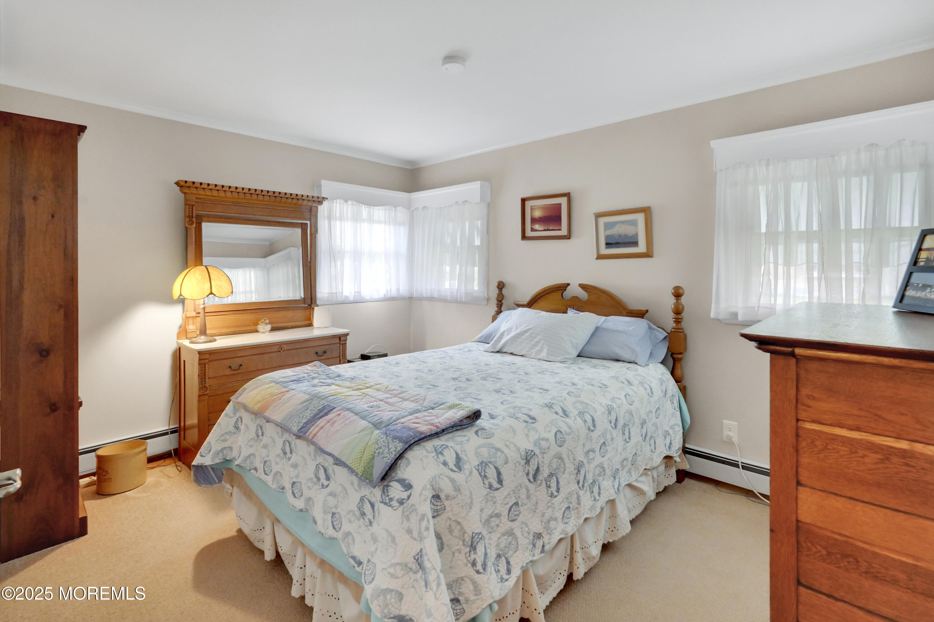 1635 Marconi Road Wall, NJ 07719 - Photo 15 of 39 a bedroom with a bed and a lamp with window