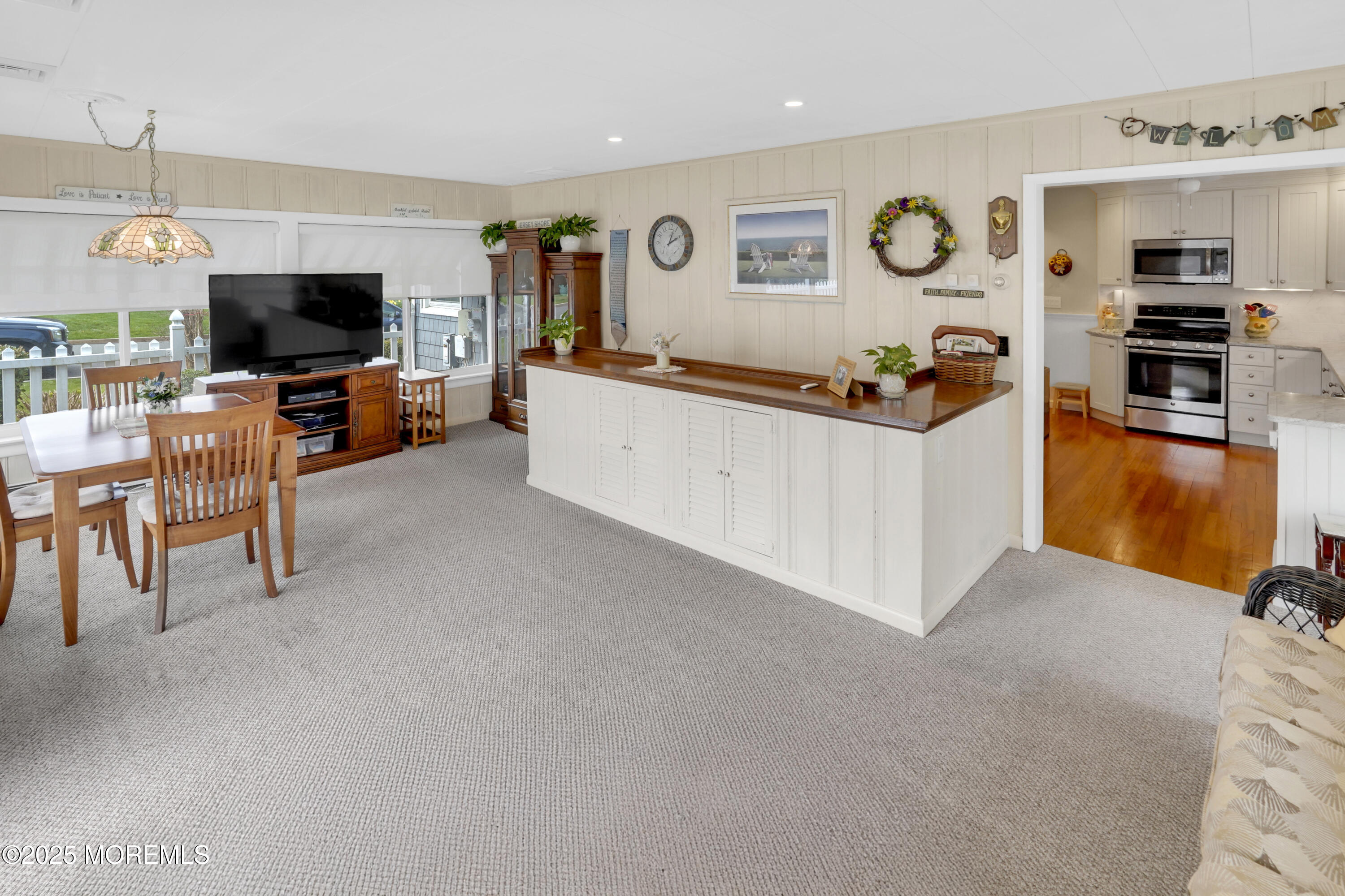 1635 Marconi Road Wall, NJ 07719 - Photo 17 of 39 a living room with furniture flat screen tv and a fireplace