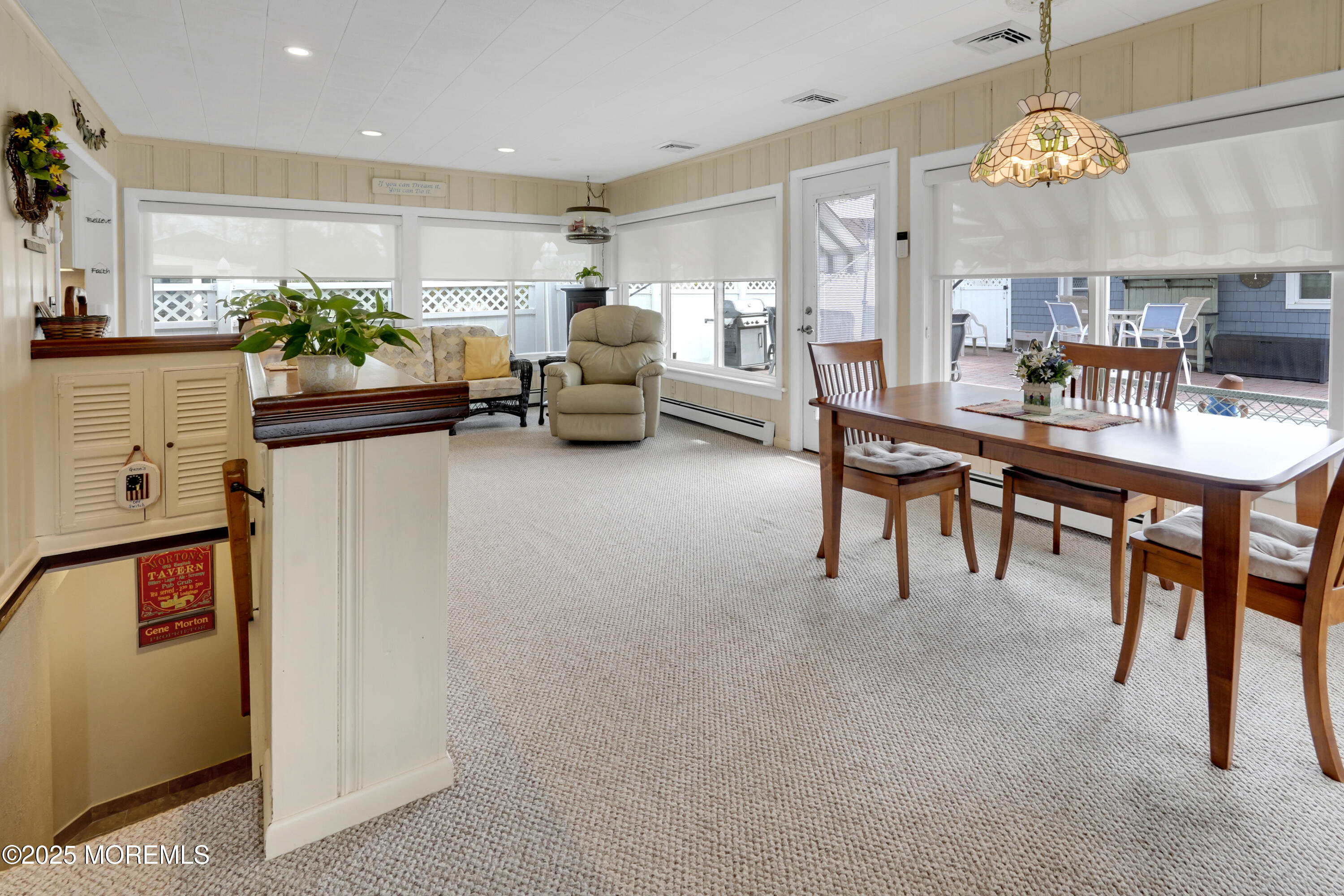 1635 Marconi Road Wall, NJ 07719 - Photo 18 of 39 a living room with furniture a chandelier and kitchen view