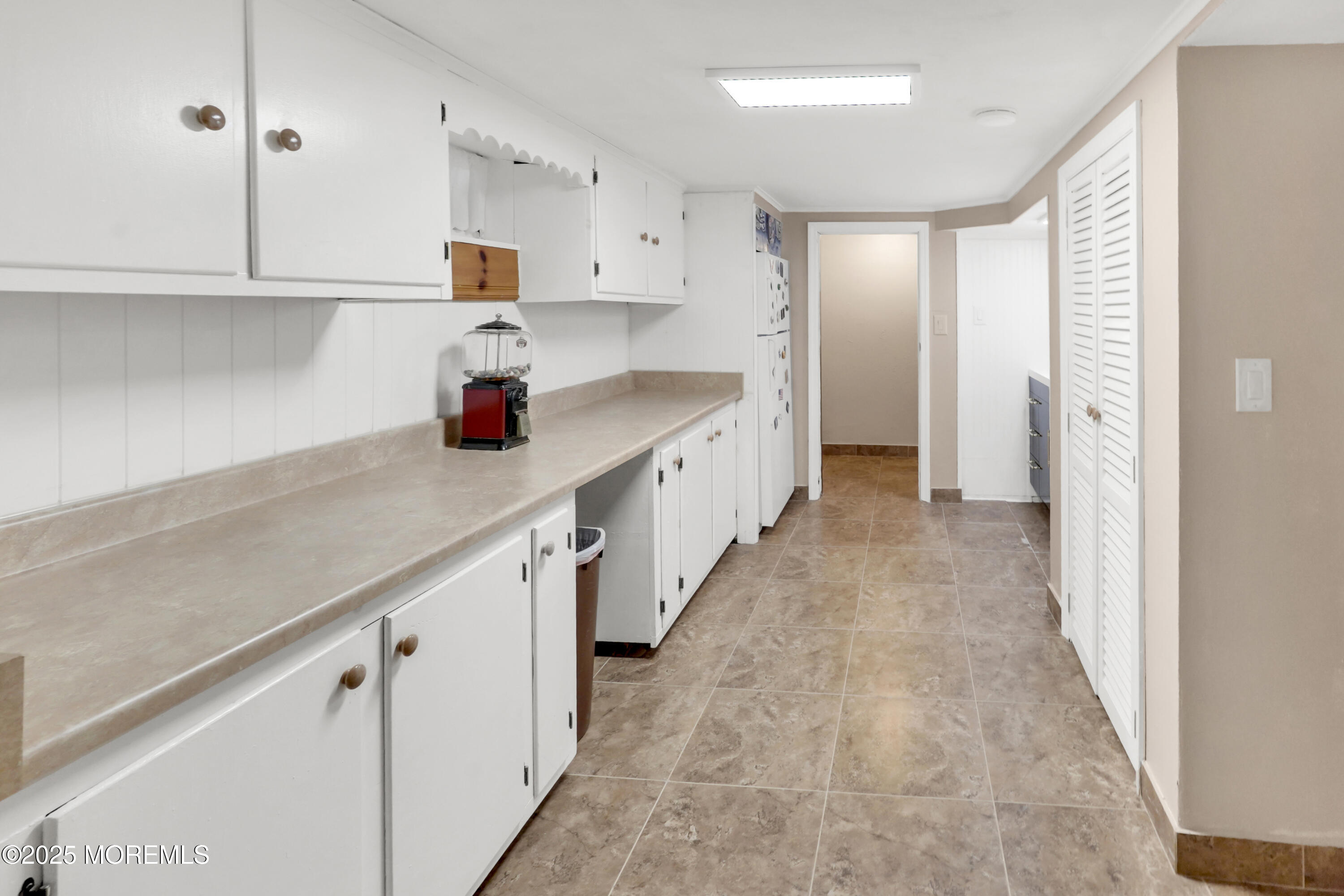 1635 Marconi Road Wall, NJ 07719 - Photo 26 of 39 a kitchen with cabinets and window