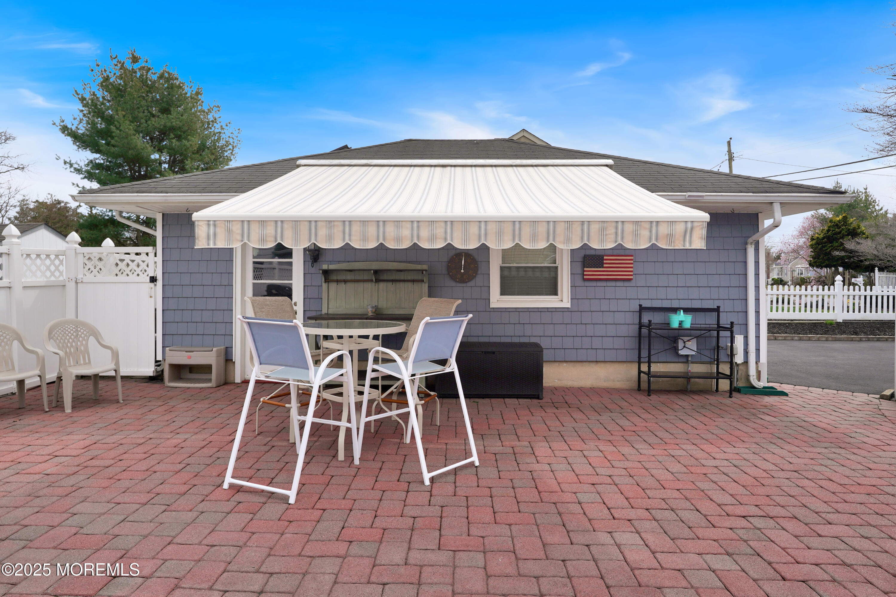 1635 Marconi Road Wall, NJ 07719 - Photo 36 of 39 a patio with a table and chairs