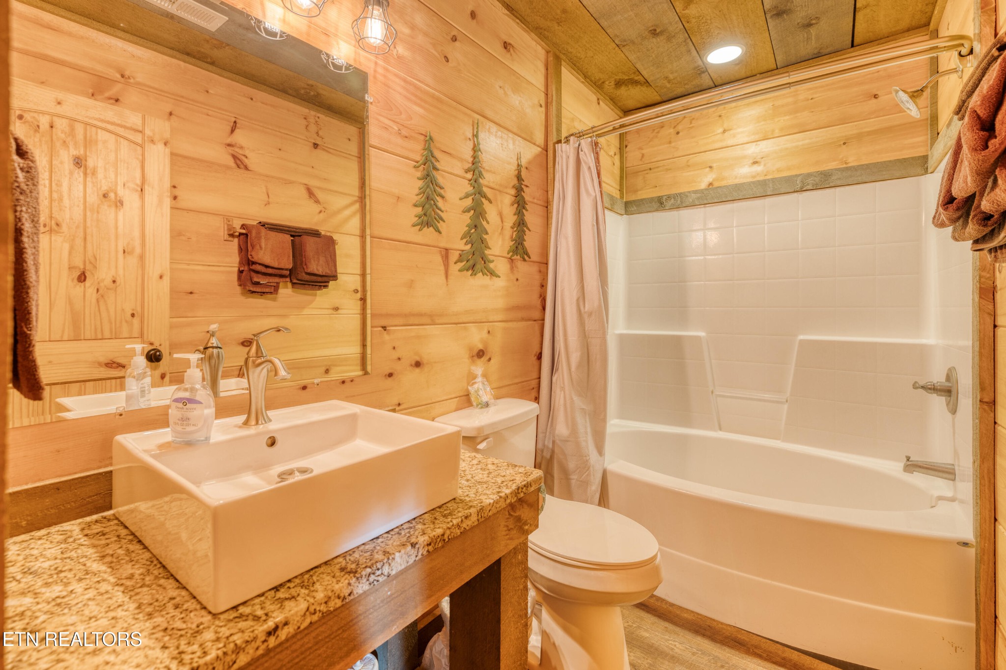 809 Pinecrest Way Sevierville, TN 37862 - Photo 42 of 60 a bathroom with a sink toilet vanity and shower