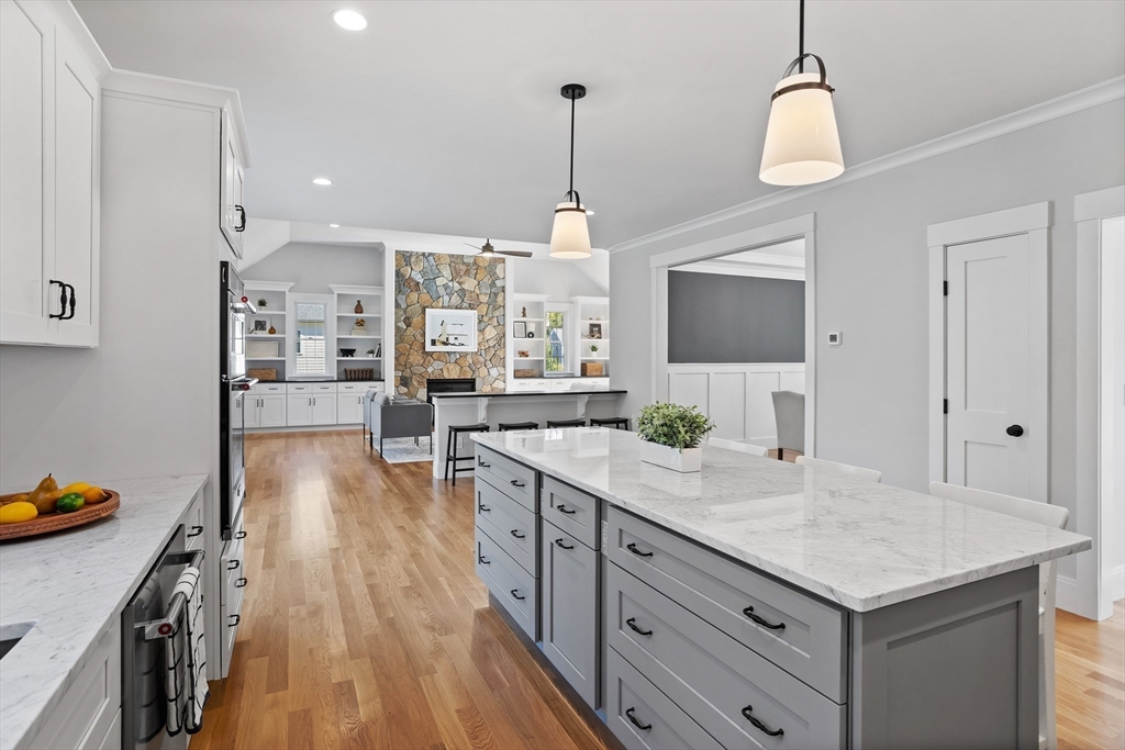 236 Bolton Road Harvard, MA 01451 - Photo 11 of 42 a kitchen with sink cabinets and wooden floor