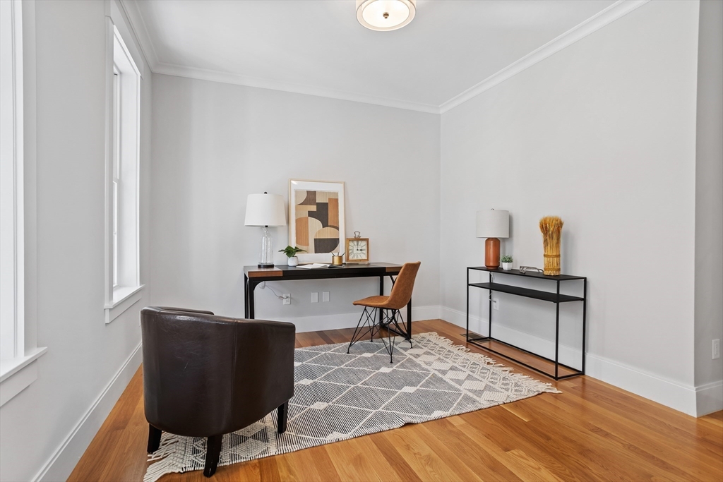 236 Bolton Road Harvard, MA 01451 - Photo 15 of 42 a living room with furniture and a wooden floor