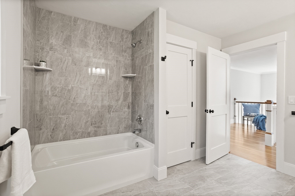 236 Bolton Road Harvard, MA 01451 - Photo 21 of 42 a bathroom with a bathtub and a shower