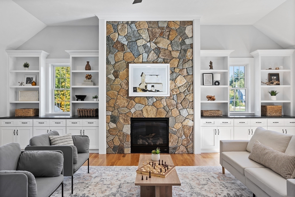 236 Bolton Road Harvard, MA 01451 - Photo 3 of 42 a living room with furniture and a fireplace