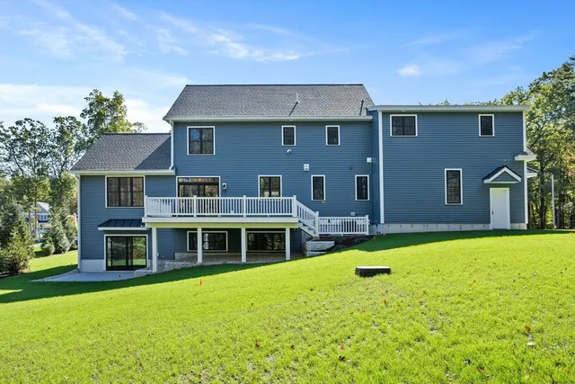 a front view of the house with yard