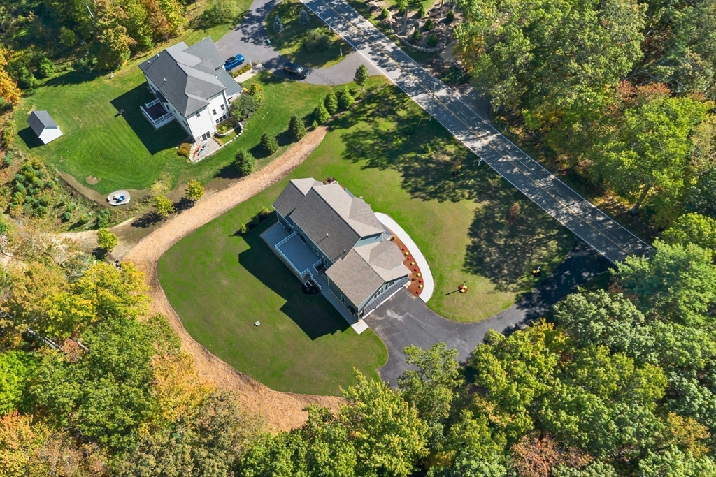 236 Bolton Road Harvard, MA 01451 - Photo 39 of 42 an aerial view of a house with a swimming pool