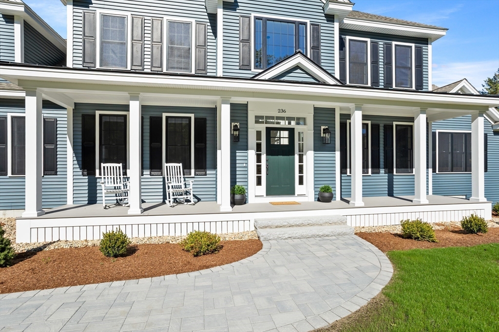 236 Bolton Road Harvard, MA 01451 - Photo 41 of 42 front view of a house with a yard
