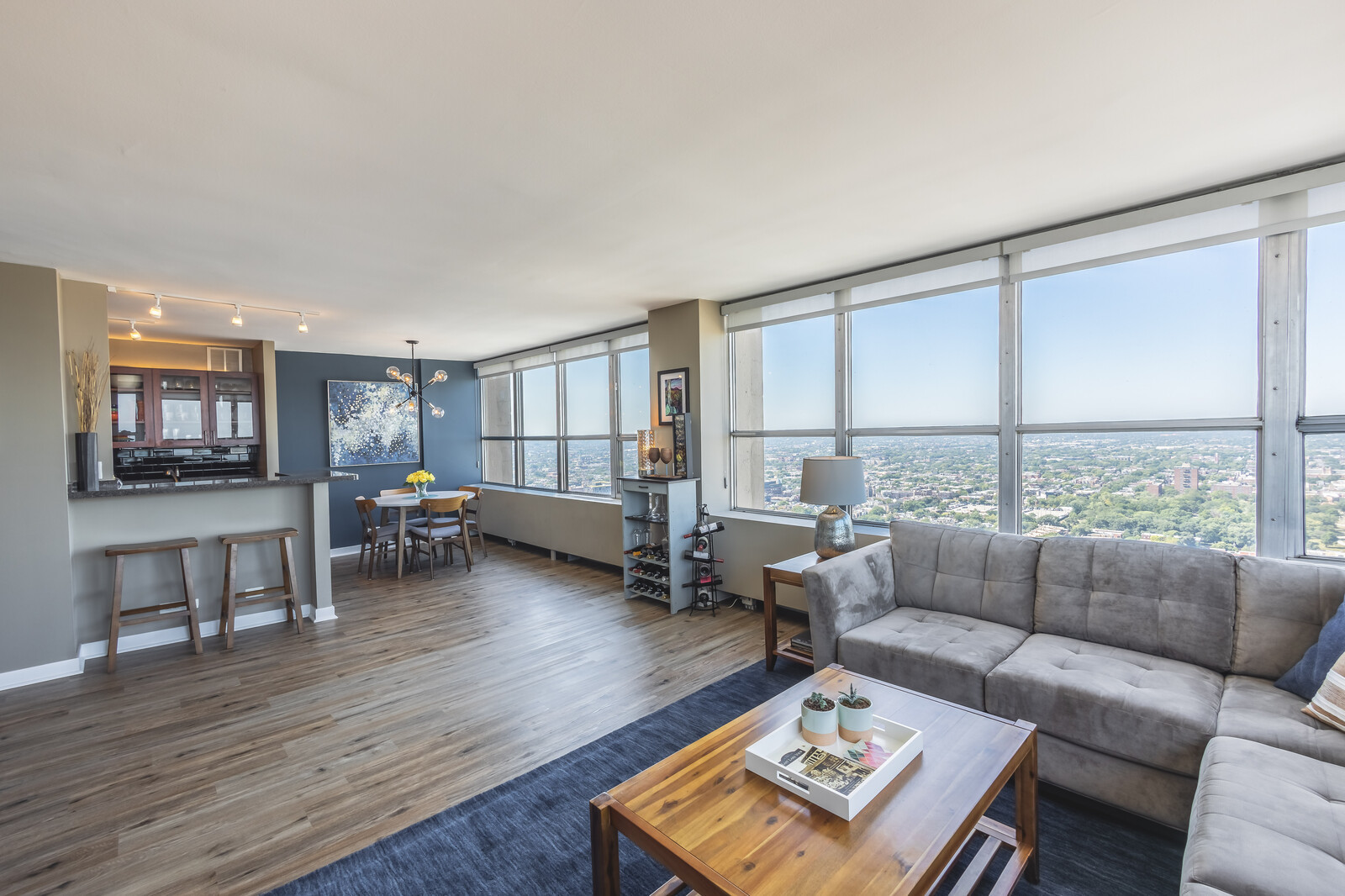 655 West Irving Park Road, Unit 4616 Chicago, IL 60613 - Photo 3 of 25 a living room with furniture and a large window