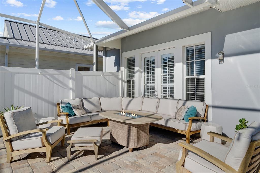 5210 Covesound Way Apollo Beach, FL 33572 - Photo 35 of 82 a outdoor space with patio furniture and windows