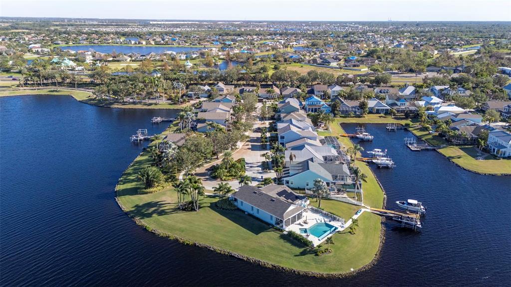 5210 Covesound Way Apollo Beach, FL 33572 - Photo 73 of 82 an aerial view of a house with a lake view