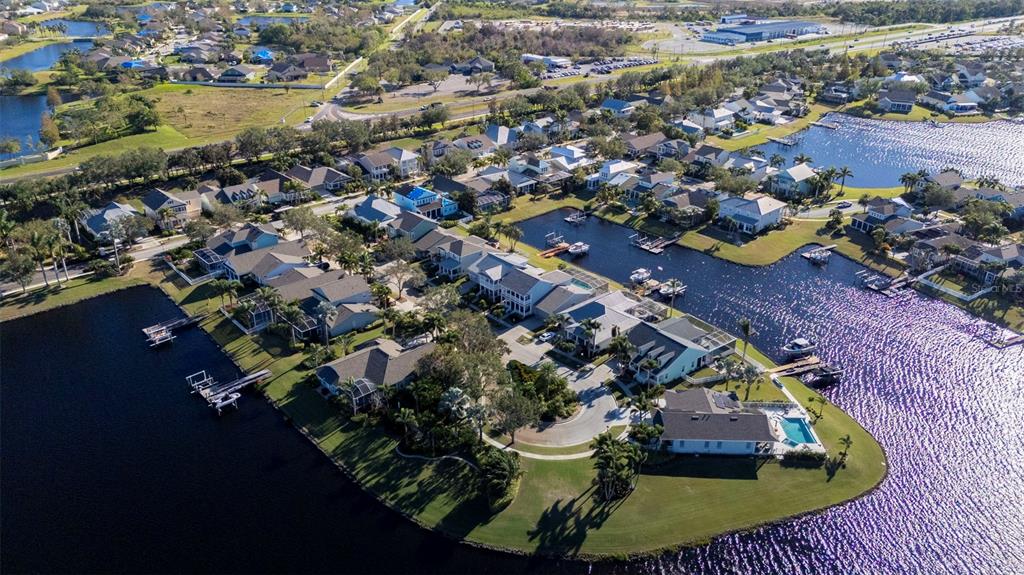 5210 Covesound Way Apollo Beach, FL 33572 - Photo 75 of 82 an aerial view of residential houses with outdoor space