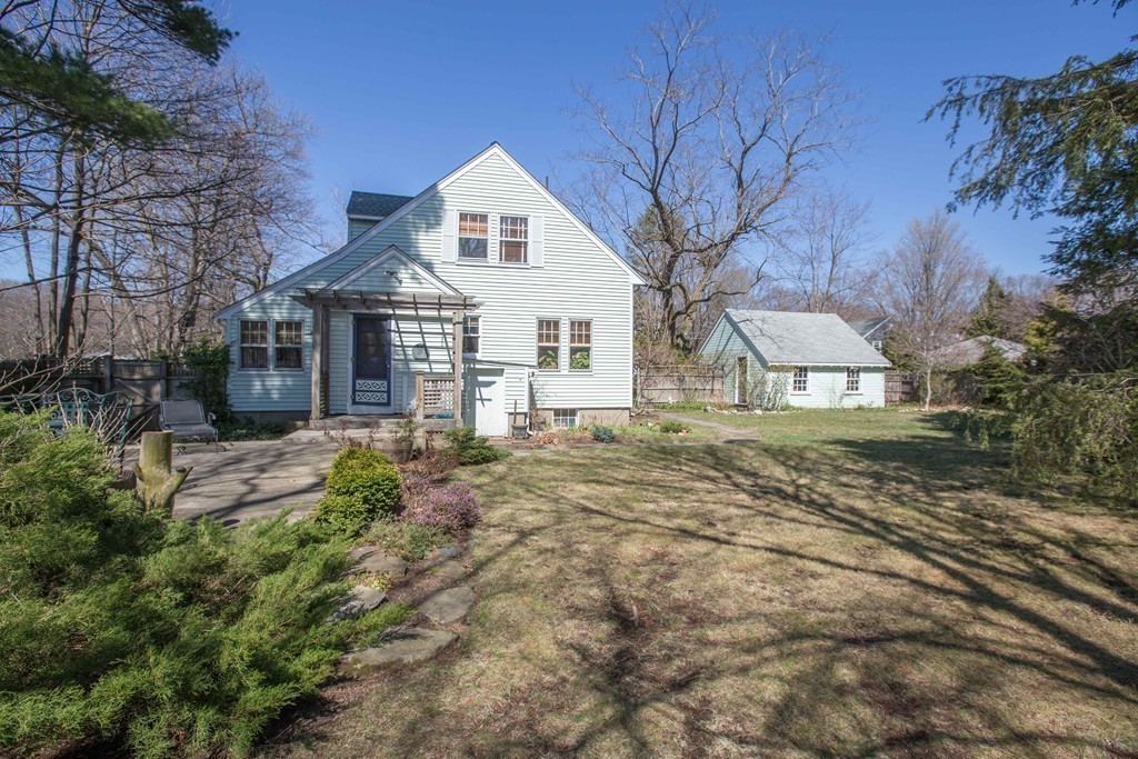18 Rider Terrace Newton, MA 02466 - Photo 15 of 19 a front view of a house with a yard