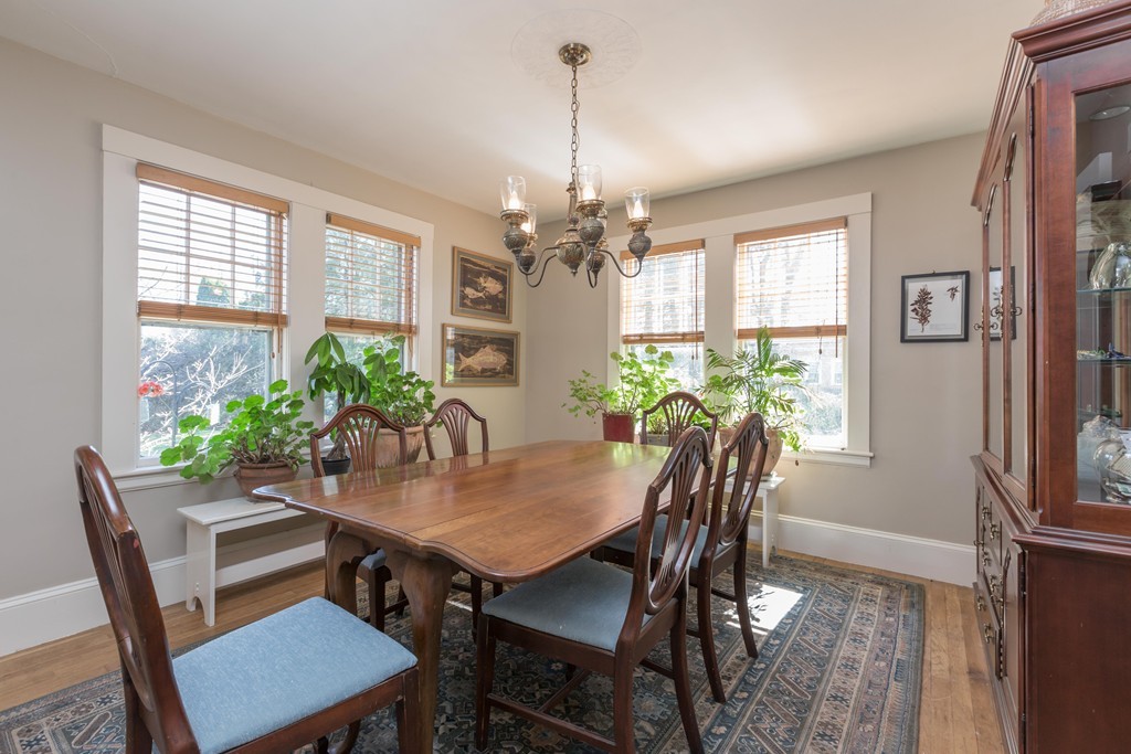 18 Rider Terrace Newton, MA 02466 - Photo 2 of 19 a view of a dining room with furniture window and wooden floor