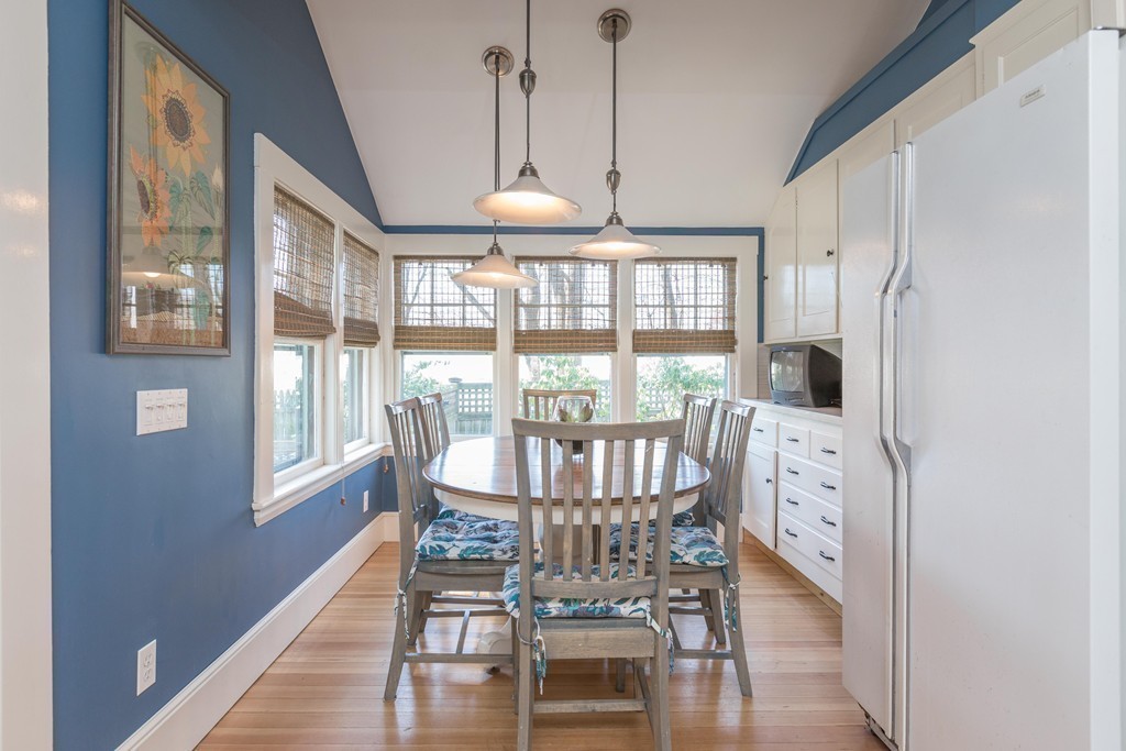 18 Rider Terrace Newton, MA 02466 - Photo 8 of 19 a view of a dining room with furniture window and wooden floor