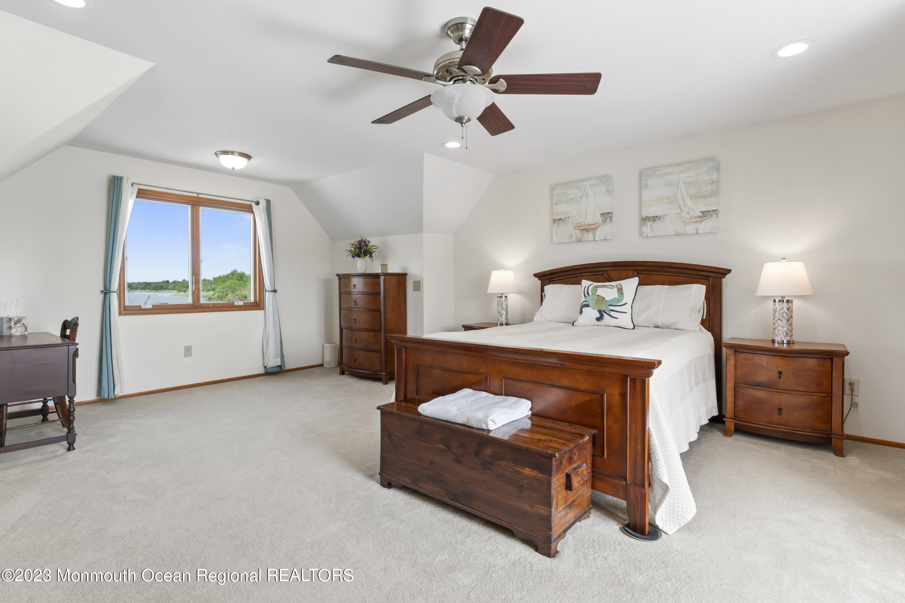 42 Capstan Road Waretown, NJ 08758 - Photo 14 of 57 a bed room with furniture and a window