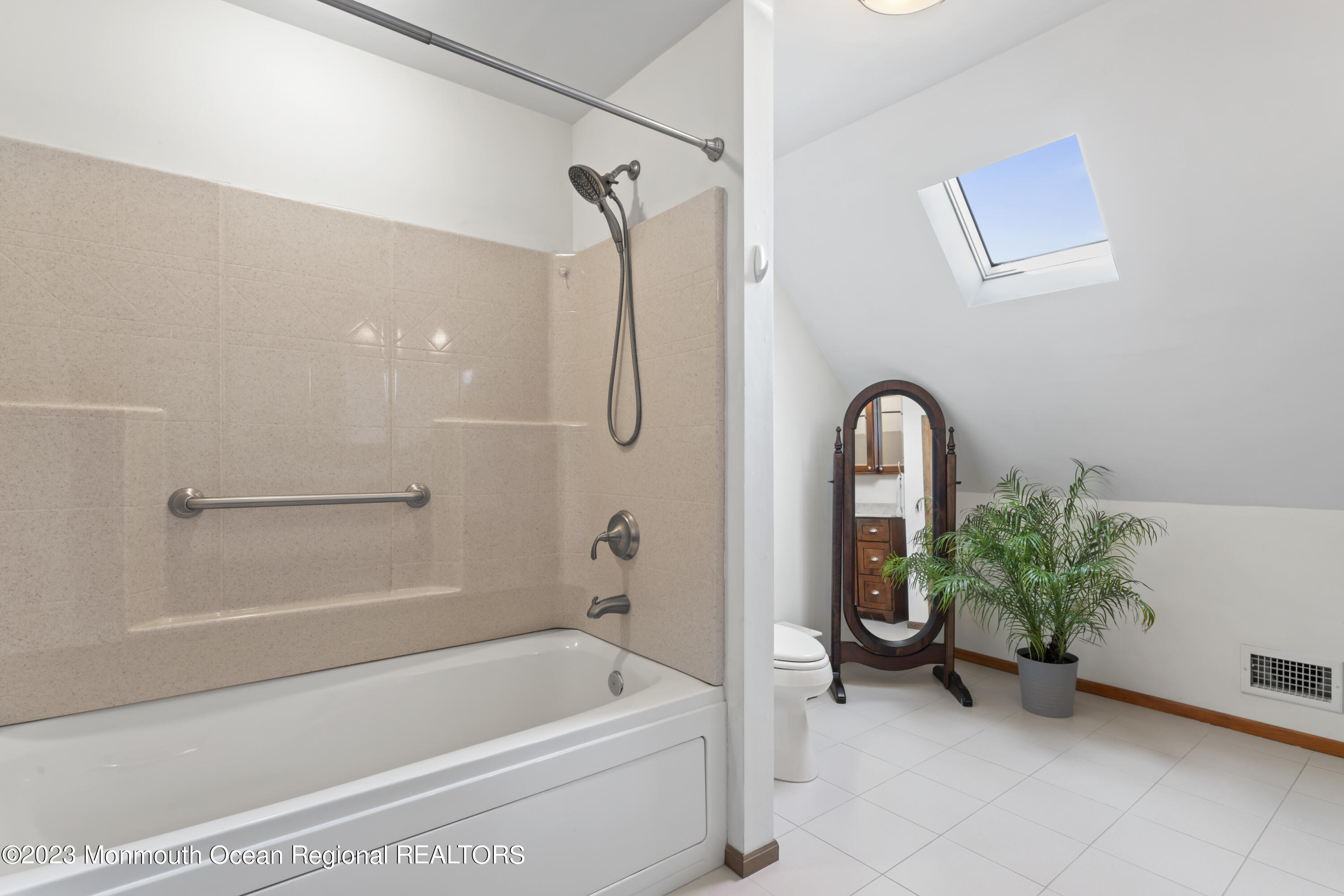 42 Capstan Road Waretown, NJ 08758 - Photo 18 of 57 a bathroom with a tub and a shower