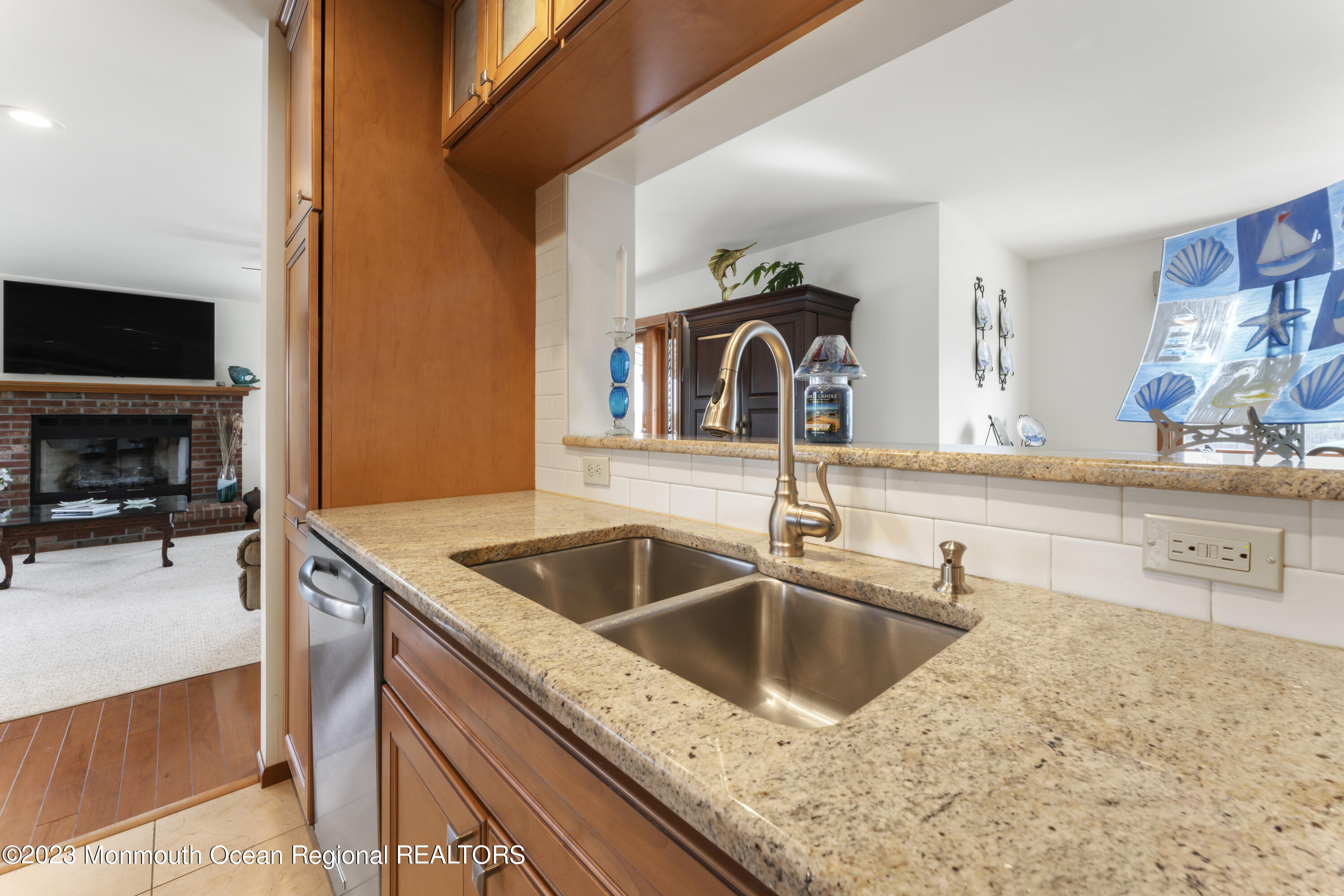 42 Capstan Road Waretown, NJ 08758 - Photo 45 of 57 a kitchen with sink cabinets and a stove top oven
