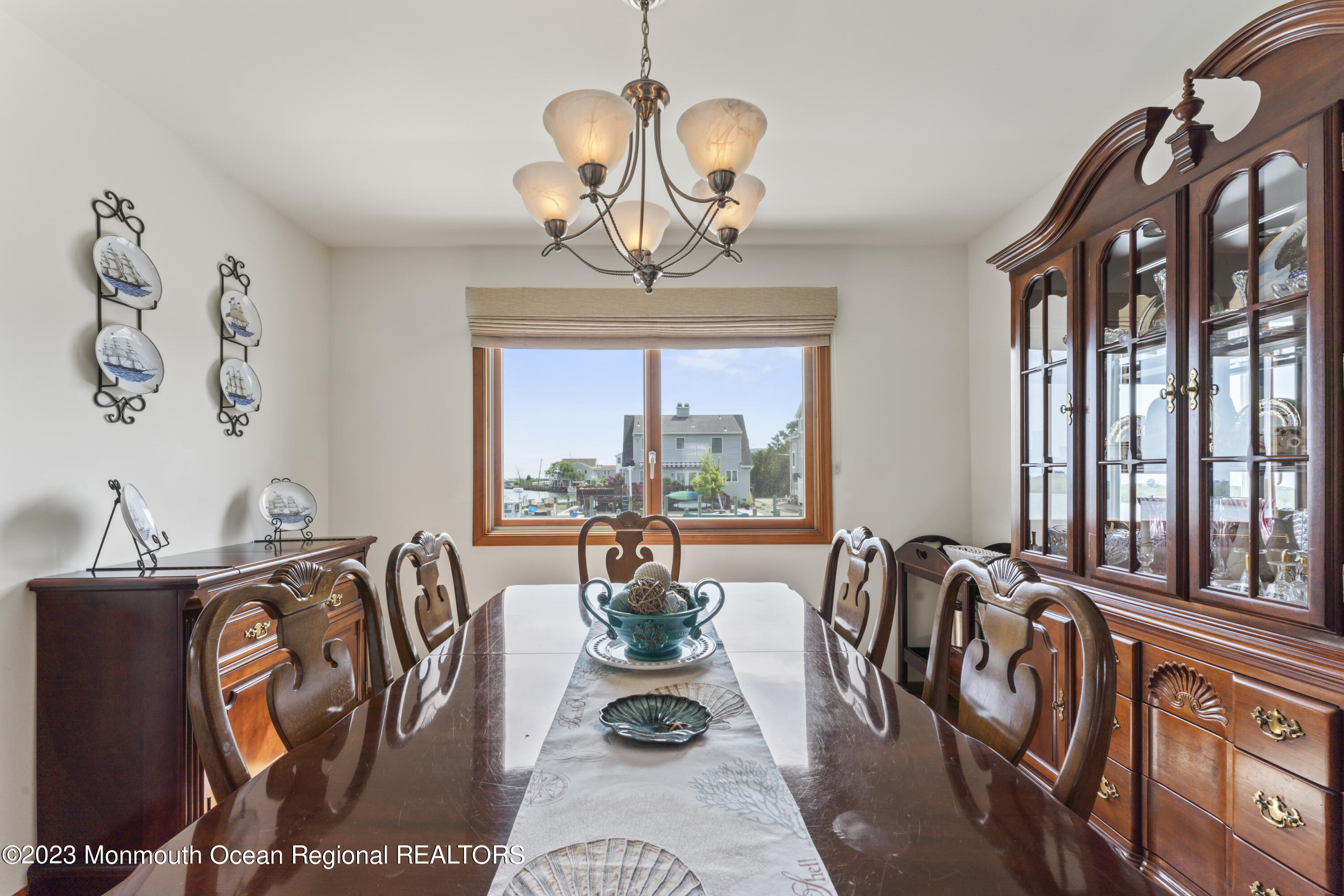 42 Capstan Road Waretown, NJ 08758 - Photo 51 of 57 a view of a livingroom with furniture window and outside view
